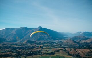 Parachute over New Zealand landscape